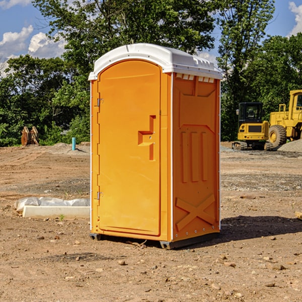 how often are the portable restrooms cleaned and serviced during a rental period in La Plume